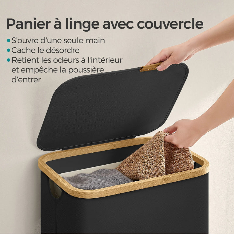 panier à linge avec du linge dedans et le couvercle lever 