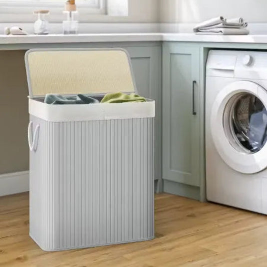 Panier à linge double gris a coter d'une machine a laver 