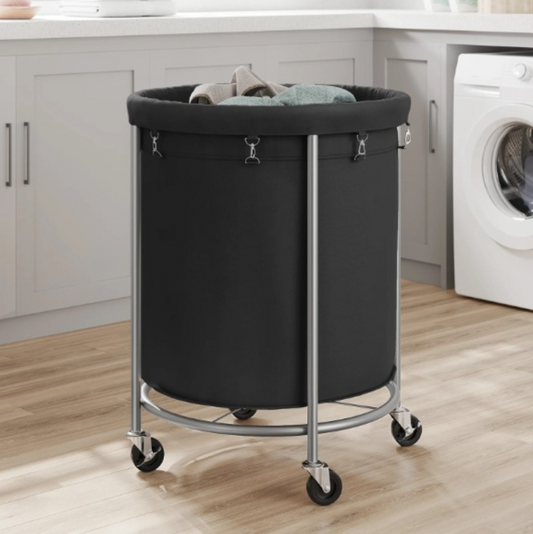 Panier à linge avec roulettes noir  170L à coter d'une machine à laver 