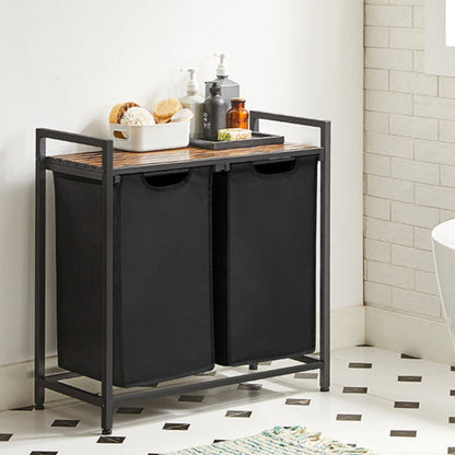 Panier à linge double noir avec étagère dans une salle de bain avec des produits dessus 