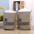 Panier à linge rond avec du linge dedans 