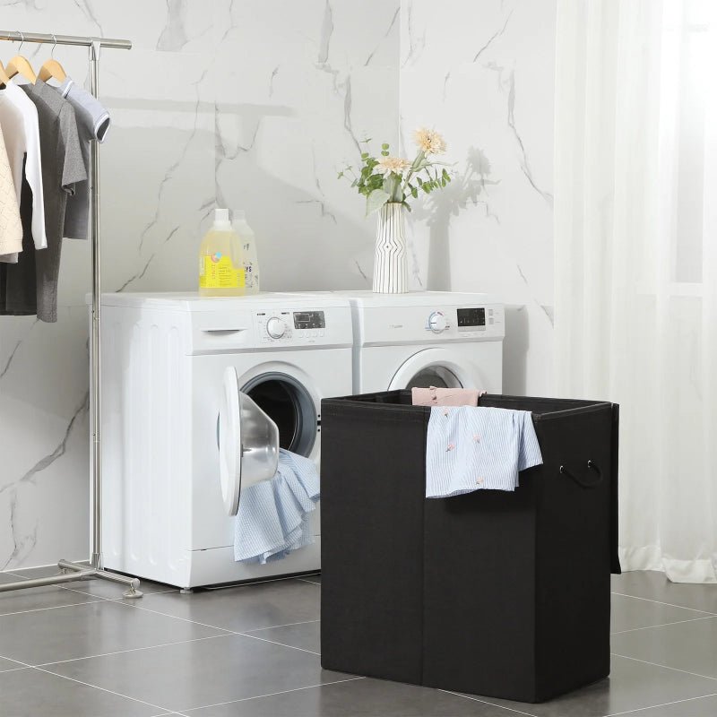 Panier à linge double noir dans une salle de bain avec des vêtements dedans 