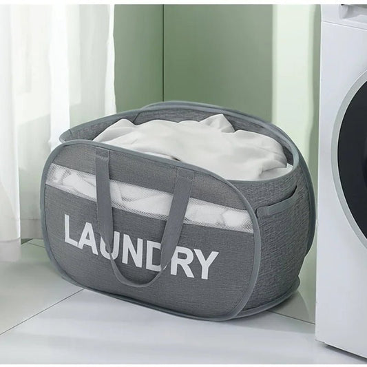 Panier à linge pliable grande capacité gris foncé avec du linge sale dedans