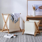 deux Paniers à linge en bois pliable dans une chambre