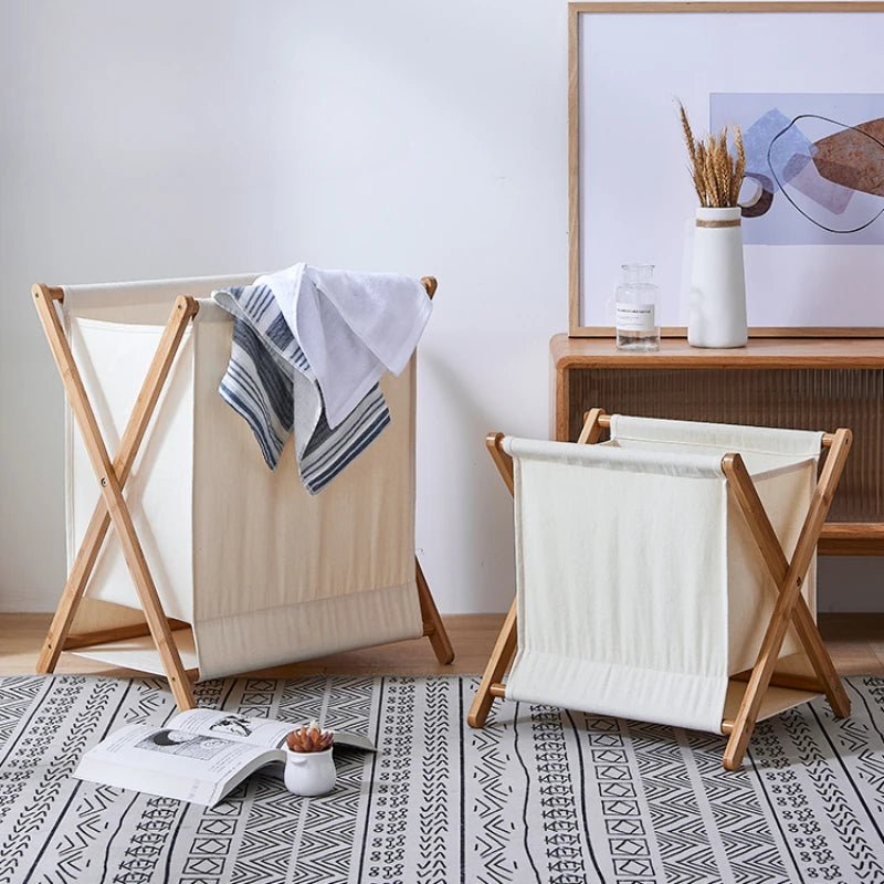 deux Paniers à linge en bois pliable dans une chambre